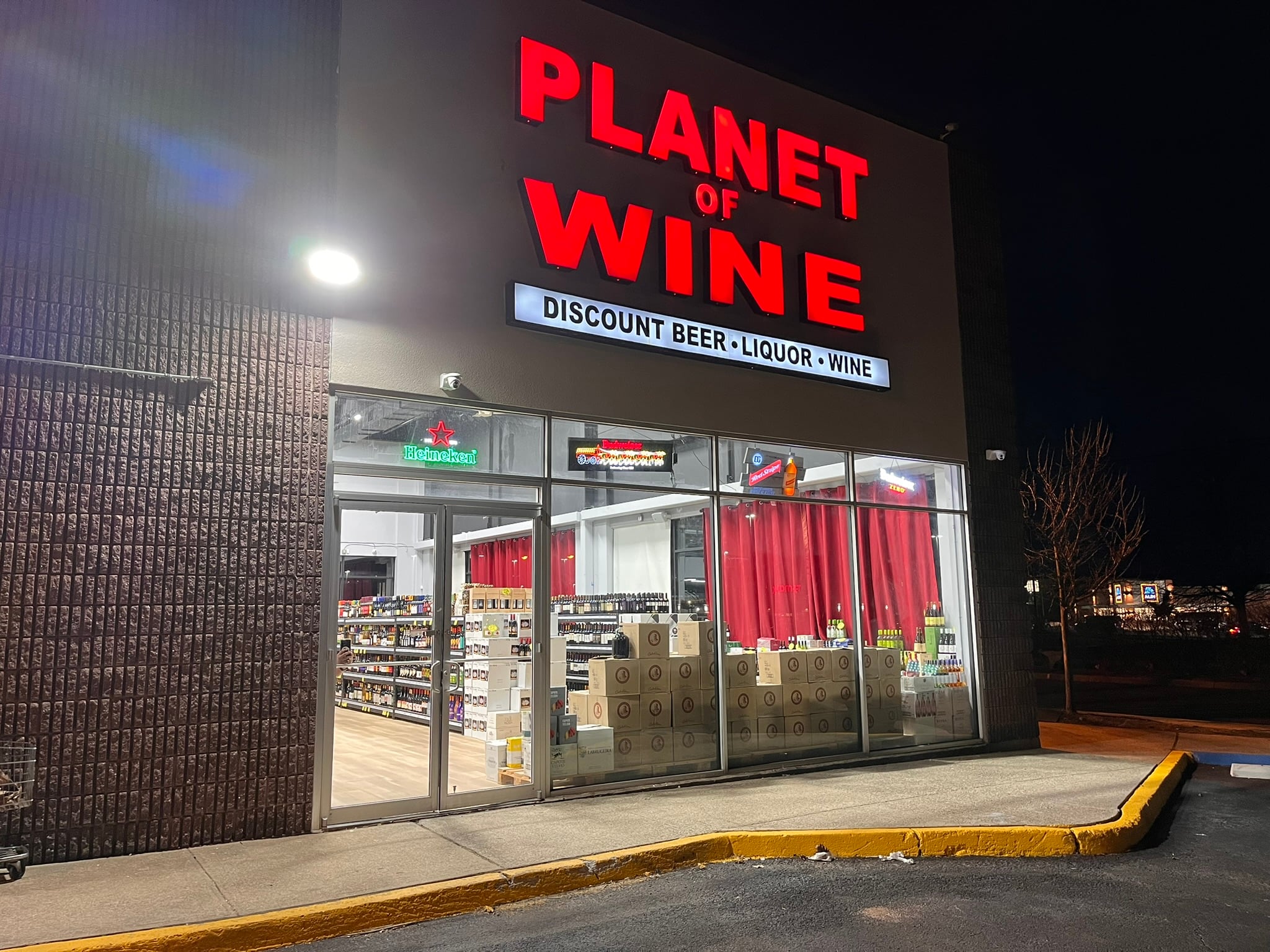 Premium spirits collection background featuring fine wines and whiskeys